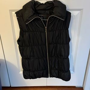 Black puffer vest, great condition w/ pockets & high collar.